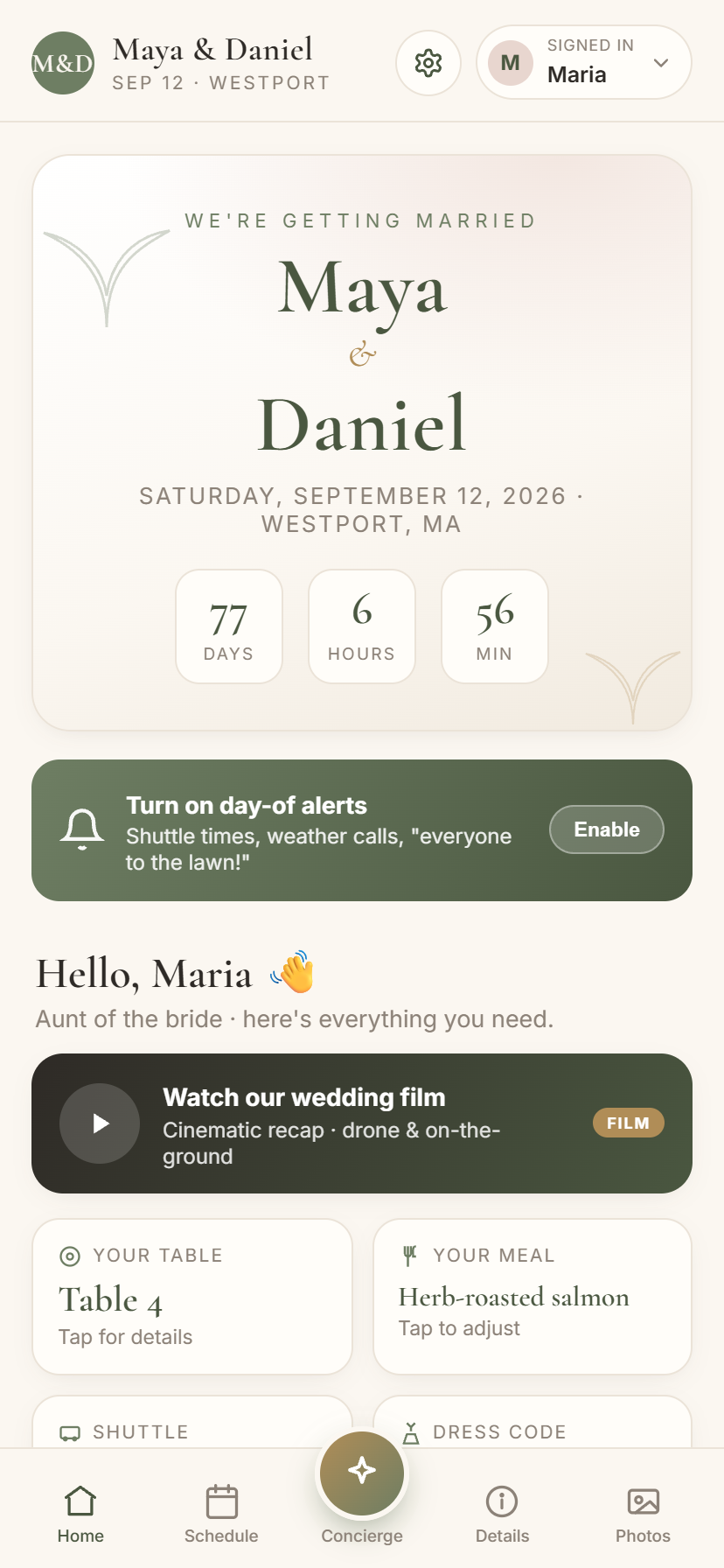 A guest's personalized wedding app showing their table, meal, and shuttle